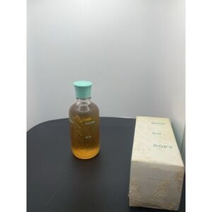 vintage Avon Skin So Soft bath oil bottle and box,  1960